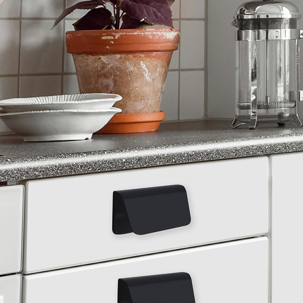 Aluminium cabinet knob 409 — sloped wedge knob with soft edge in Satin Black finish, 32mm