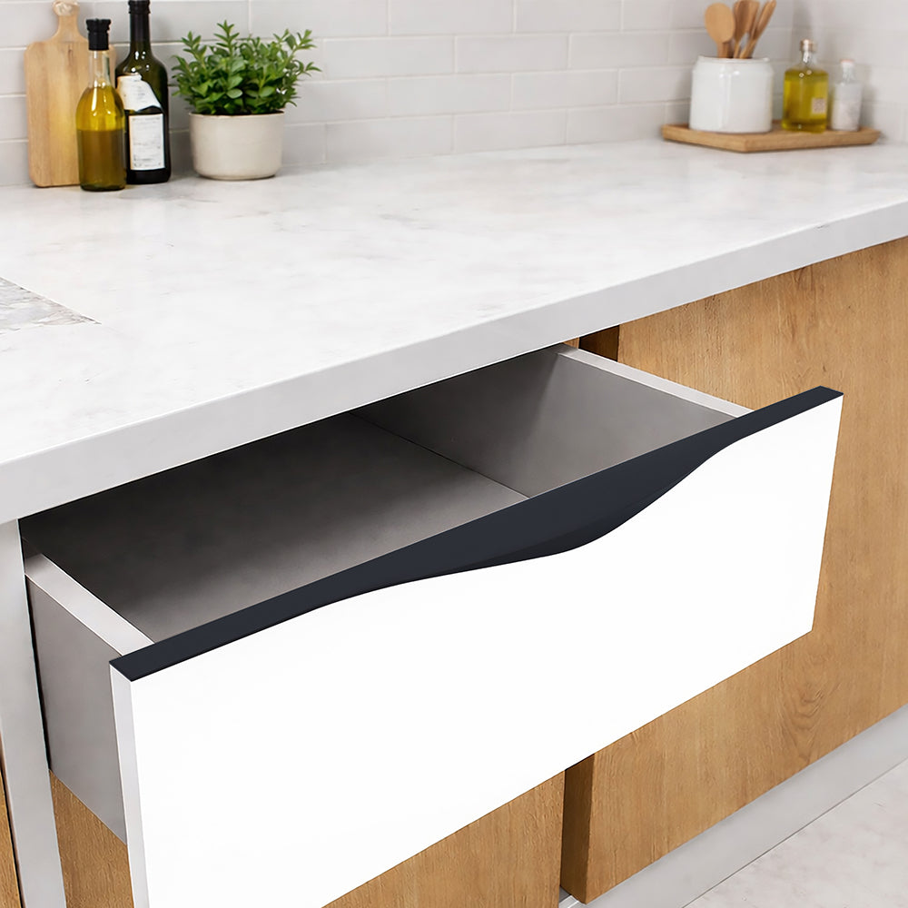 Edge Profile Handle 016 BS installed on open kitchen drawer with cutlery and spice organizer